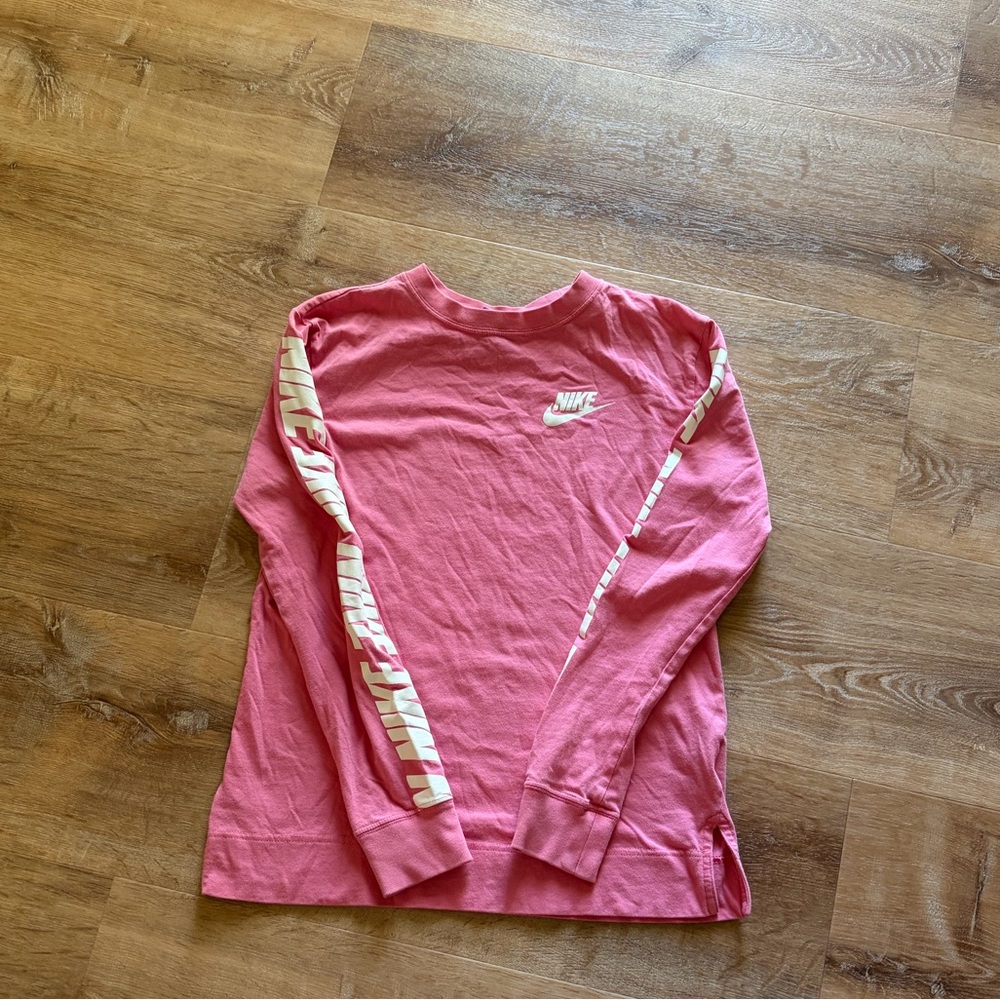 Pink Nike shirt